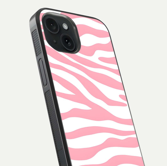 Blush Zebra Flow iPhone 15 glass phone case angled back view highlighting bold zebra artwork and textured side grip