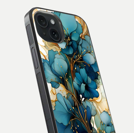 Golden Bloom Symphony Glass Case for iPhone 15 close-up angled shot showing detailed petals and metallic gold reflection