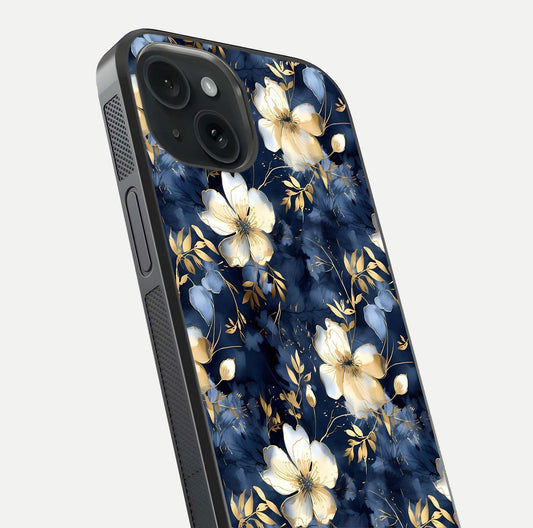 Golden Midnight Bloom Glass Case for iPhone 15 close-up angled shot showing floral detail and reflection shine