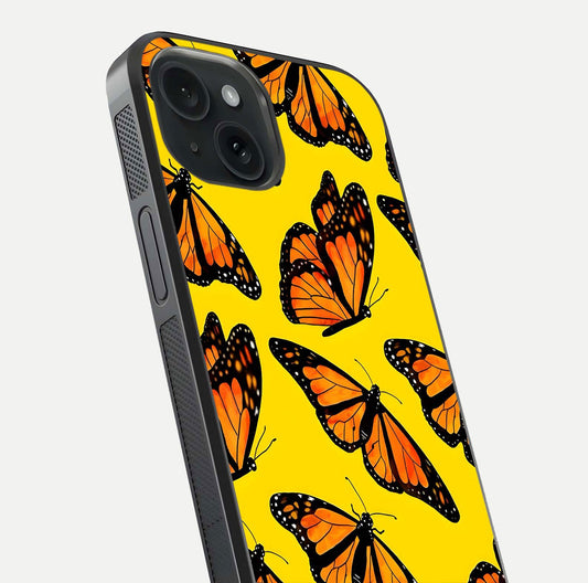 Golden Wing Flight Glass Case for iPhone 15 close-up angled shot showing metallic wing texture and shine detail