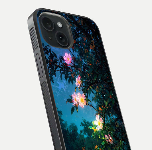 Midnight Bloom Glow Glass Case for iPhone 15 close-up angled shot showing petal highlights and glow reflection