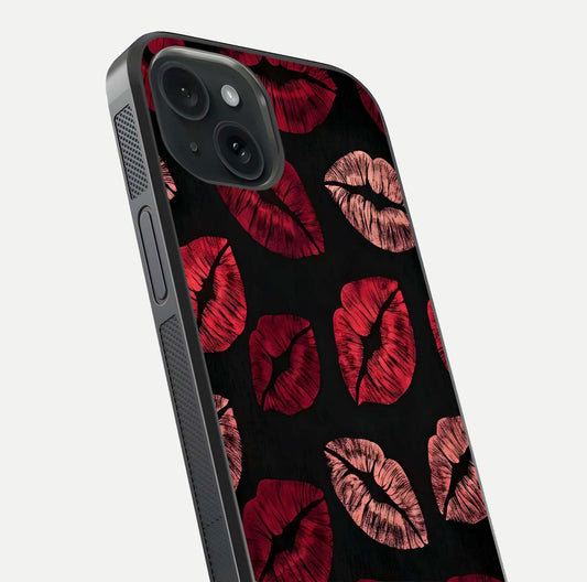 Midnight Kiss Love Glass Case for iPhone 15 close-up angle highlighting red accents and reflection shine