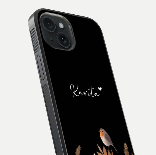 Quiet Garden Tune Custom Name Glass Case for iPhone 15 close-up angled shot showing soft tones and gloss reflection