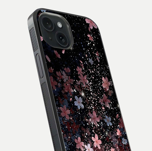 Starlit Flower Dreams Glass Case for iPhone 15 close-up angled shot highlighting petal reflection and HD depth