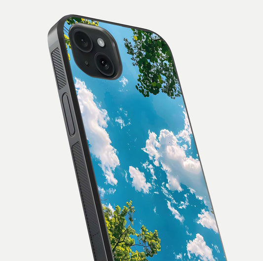 Greenery Sky Glass Case for iPhone 15 Plus close-up angled shot showing leafy tones and reflection brightness