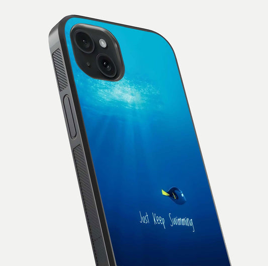 Just Keep Swimming Glass Case for iPhone 15 Plus close-up angled shot showing elegant lettering and blue tone reflection
