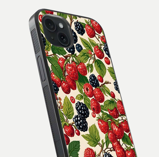 Mixed Berry Collage Glass Case for iPhone 15 Plus close-up angled shot showing fruit detail and reflection glow