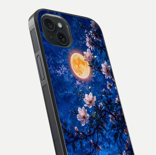 Moonlit Blossoms Night Glass Case for iPhone 15 Plus close-up angled shot showing petal glow and reflection detail