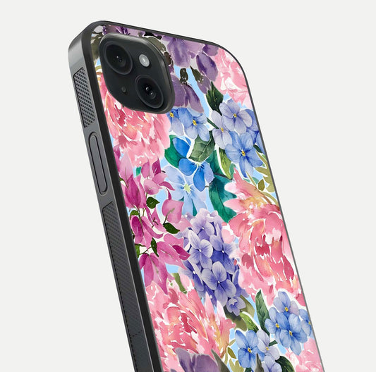 Pastel Floral Mix Glass Case for iPhone 15 Plus close-up angled shot highlighting flower detail and reflection