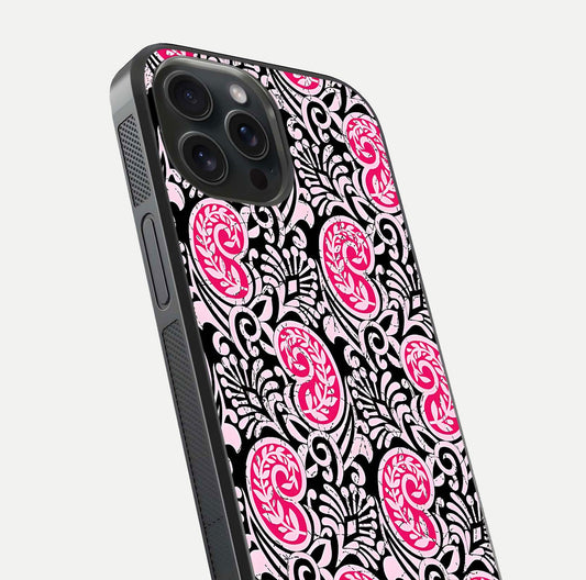 Crimson Paisley Charm Glass Case for iPhone 15 Pro close-up highlighting fine pattern detail and reflection tone