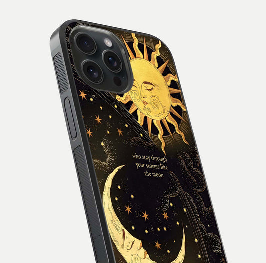 Golden Lunar Love Glass Case for iPhone 15 Pro close-up angled shot showing moon glow, texture, and reflection polish