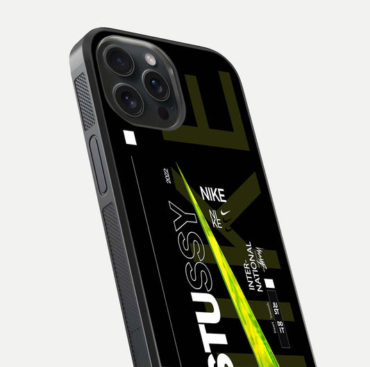 Neon Street Edition Glass Case for iPhone 15 Pro close-up angled shot showing urban neon lights and shine