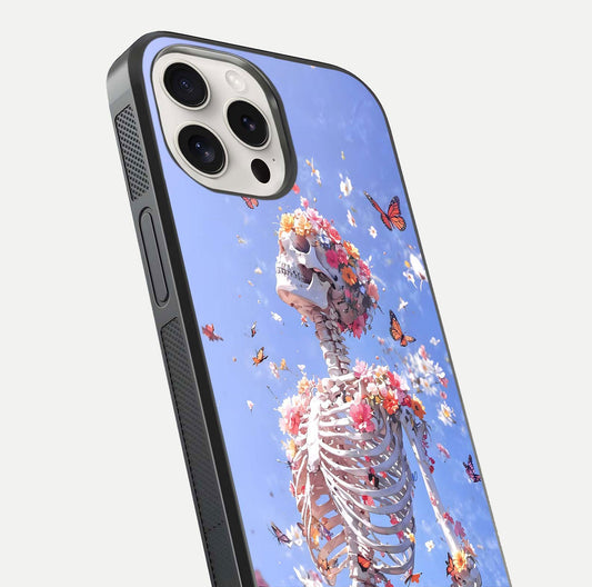 Bloom Beyond Bones Glass Case for iPhone 15 Pro Max close-up highlighting unique bone-floral fusion art and reflection