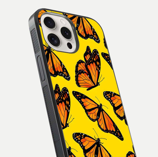 Golden Wing Flight Glass Case for iPhone 15 Pro Max close-up angled shot showing metallic wing texture and shine detail
