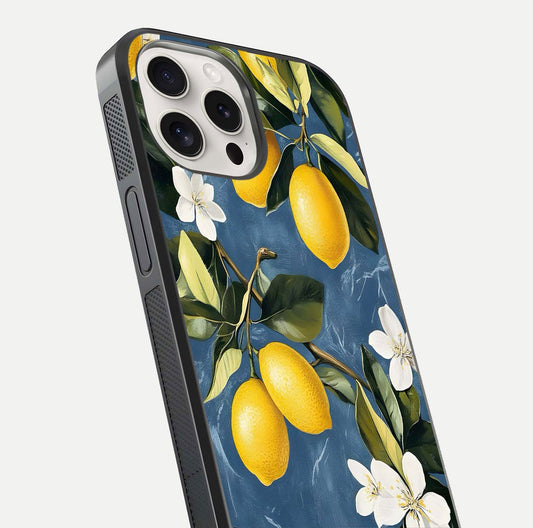 Lemon Dream Garden Glass Case for iPhone 15 Pro Max close-up angled shot showing fruit details and shine reflection