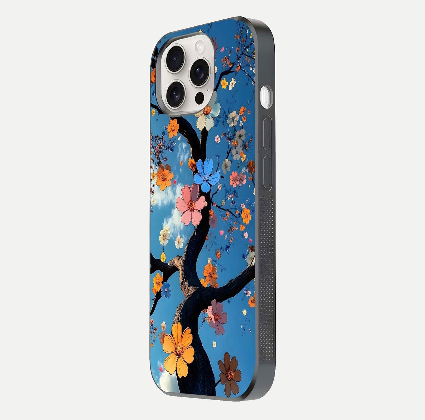 Blossom Dream Sky Glass Case for iPhone 15 Pro Max side-angle photo showing flower details, edge curve, and reflection shine