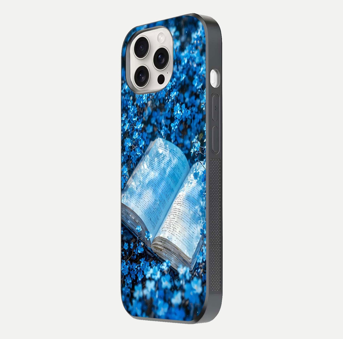 Blue Bloom Tales Glass Case for iPhone 15 Pro Max side-angle image showing blue floral pattern and glossy finish