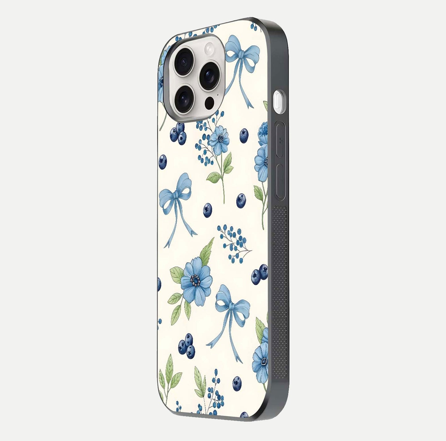 Blue Flower & Bow Glass Case for iPhone 15 Pro Max side-angle image showing bow-floral mix and HD finish shine