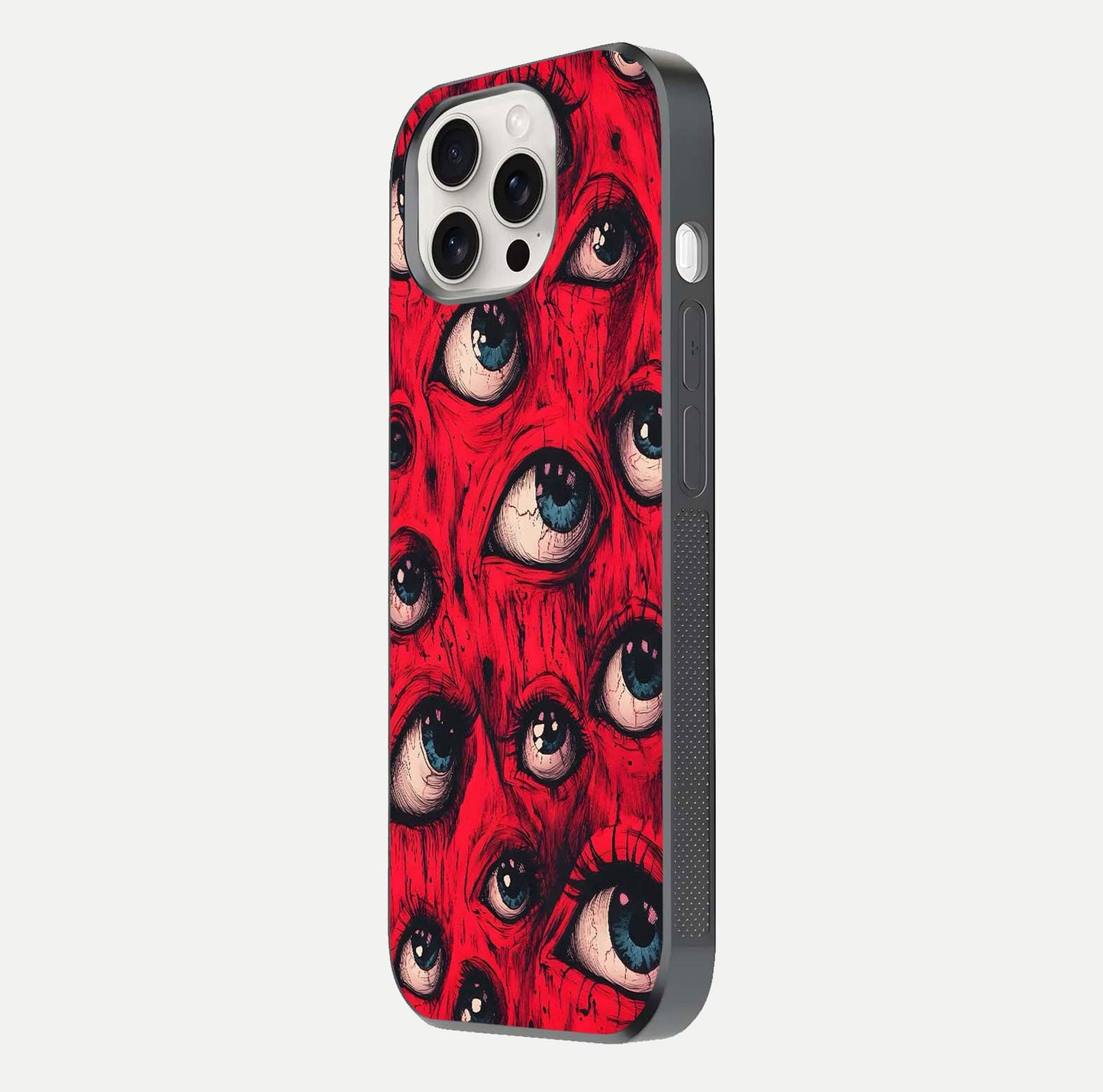 Crimson Watch Eyes Glass Case for iPhone 15 Pro Max side-angle photo showing reflection texture and shine