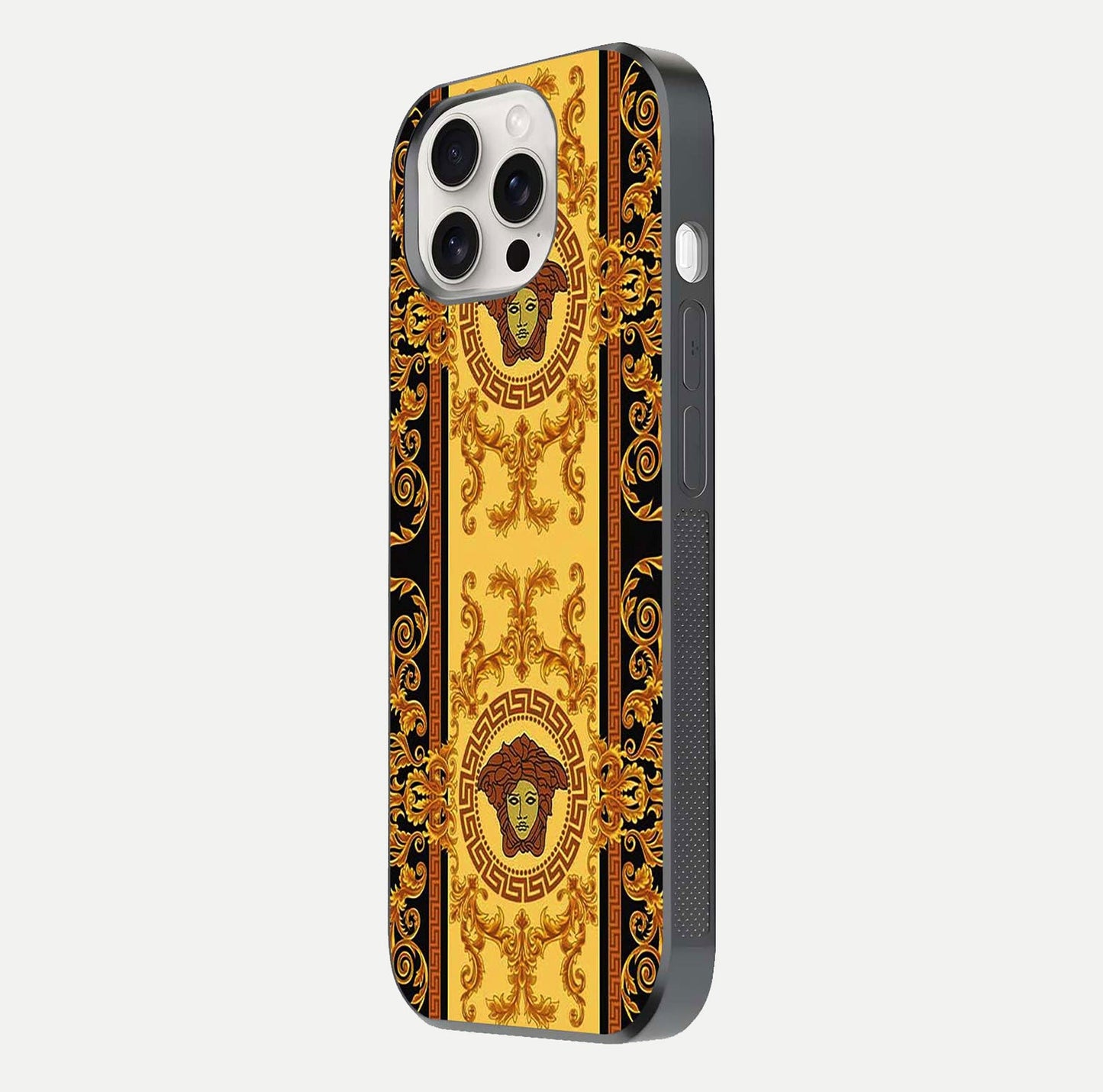 Golden Royal Heritage Glass Case for iPhone 15 Pro Max side-angle image showing reflection glow and luxury detailing