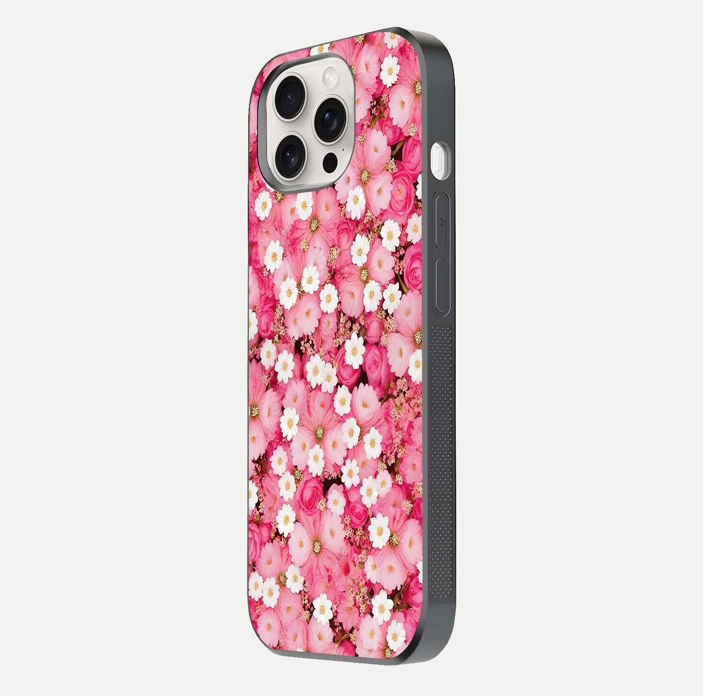 Pink Daisy Bliss Glass Case for iPhone 15 Pro Max side-angle image showing delicate daisy pattern and glass reflection