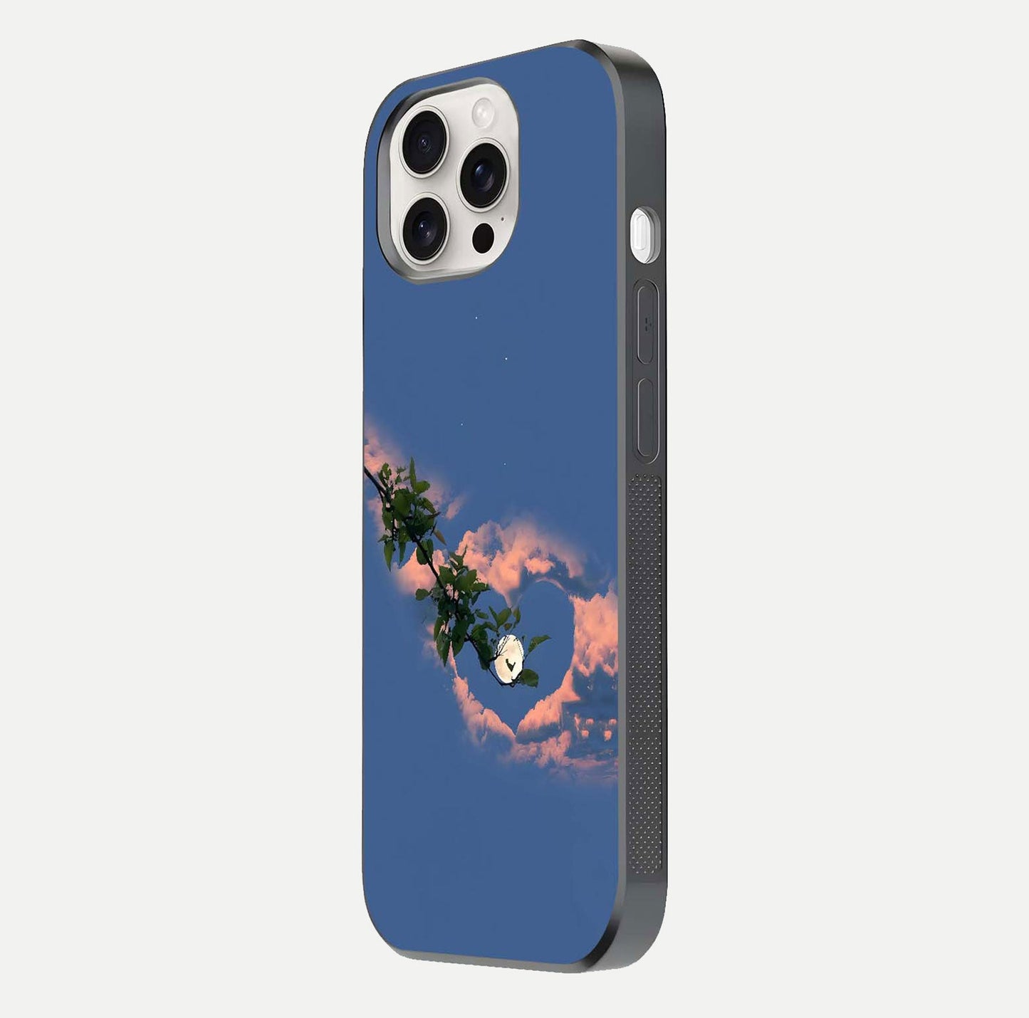 Sky Under Tree Glass Case for iPhone 15 Pro Max side-angle image showing shine, edge texture, and scenic detail