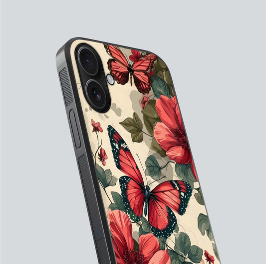 Crimson Butterfly Garden Glass Case for iPhone 16 close-up showing wing detail and reflection shine