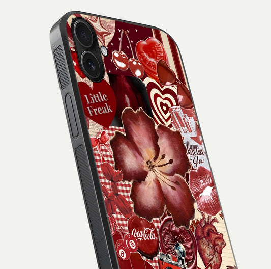 Aesthetic Little Freak Glass Case for iPhone 16 Plus close-up angled shot showing detailed artwork, bold design, and gloss reflection