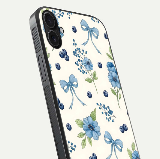 Blue Flower & Bow Glass Case for iPhone 16 Plus close-up shot highlighting ribbon detail and flower gloss finish