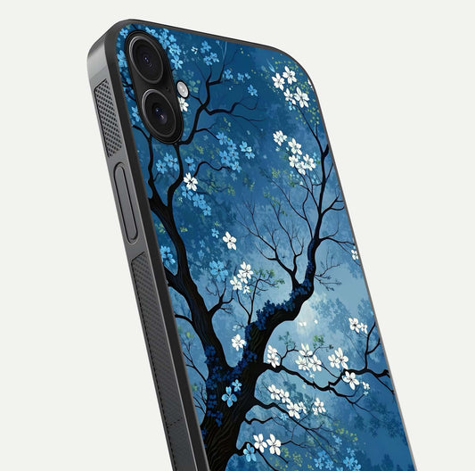 Blue Tree Serenity Glass Case for iPhone 16 Plus close-up view highlighting tree branches and reflection gloss