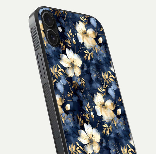 Golden Midnight Bloom Glass Case for iPhone 16 Plus close-up angled shot showing floral detail and reflection shine