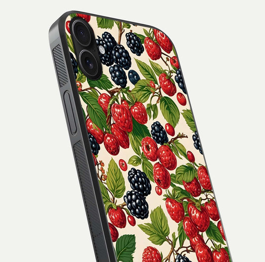 Mixed Berry Collage Glass Case for iPhone 16 Plus close-up angled shot showing fruit detail and reflection glow