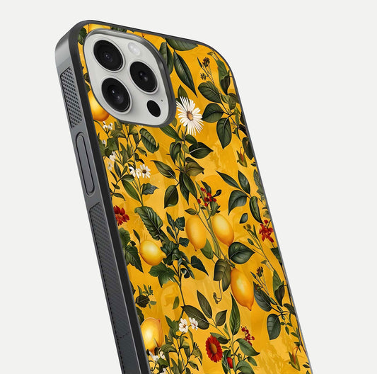 Golden Lemon Field Glass Case for iPhone 16 Pro close-up angled shot showing citrus texture and reflection brilliance