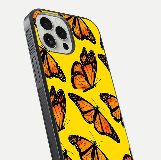 Golden Wing Flight Glass Case for iPhone 16 Pro close-up angled shot showing metallic wing texture and shine detail