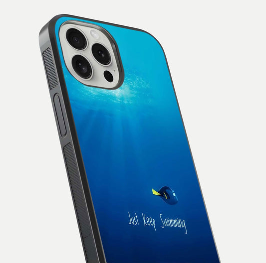 Just Keep Swimming Glass Case for iPhone 16 Pro close-up angled shot showing elegant lettering and blue tone reflection