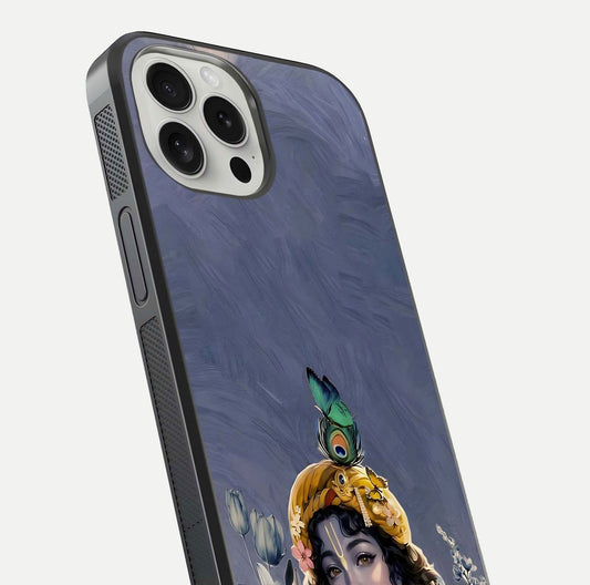 Lord Krishna Glass Case for iPhone 16 Pro angled close-up showing intricate flute and reflection details