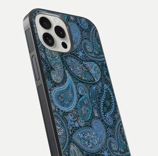 Midnight Paisley Glow Glass Case for iPhone 16 Pro close-up angled shot showing floral details and gloss texture