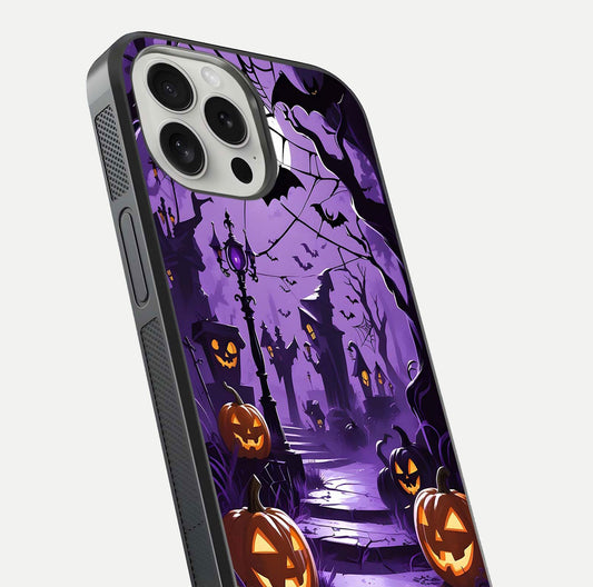Pumpkin Patch Halloween Glass Case for iPhone 16 Pro close-up angled shot highlighting pumpkin texture and shine