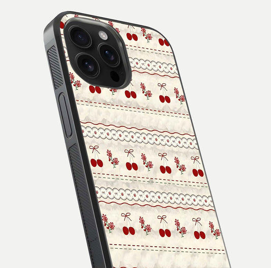 Cherry Bloom Charm Glass Case for iPhone 16 Pro Max close-up showing pink petals and reflection detail