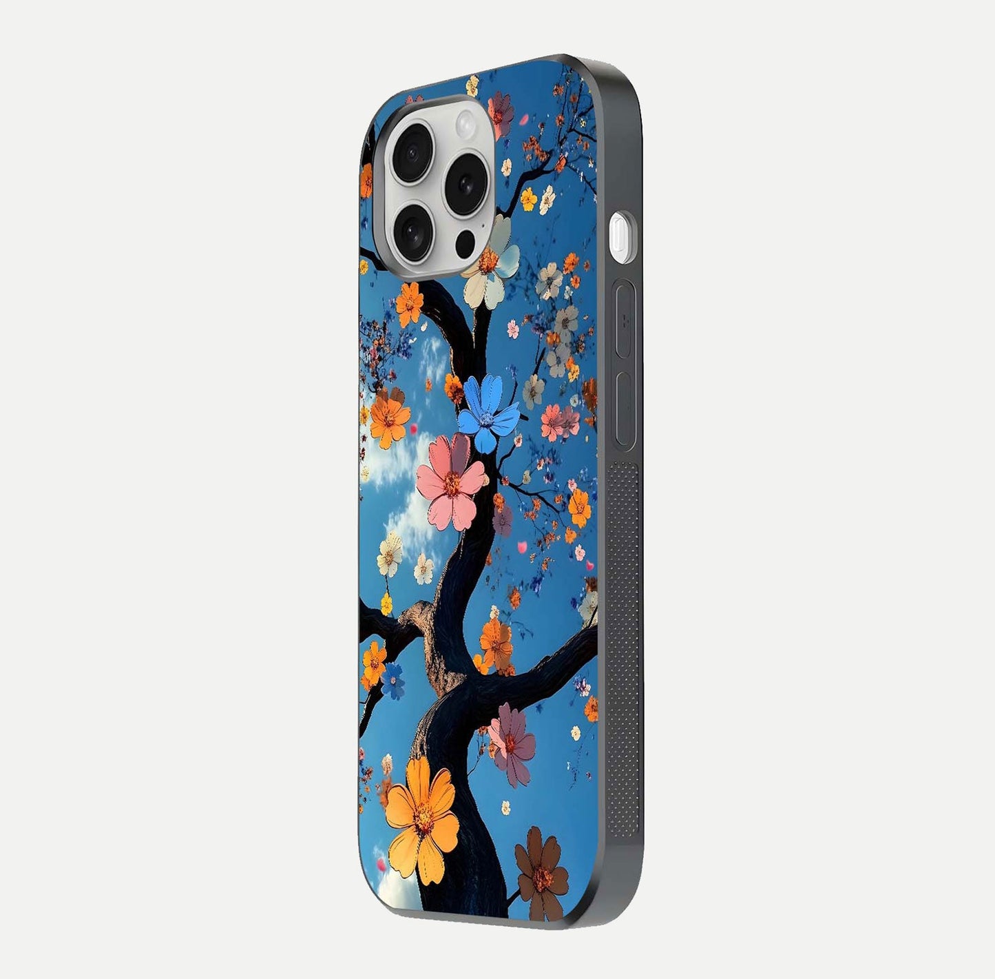 Blossom Dream Sky Glass Case for iPhone 16 Pro side-angle photo showing flower details, edge curve, and reflection shine