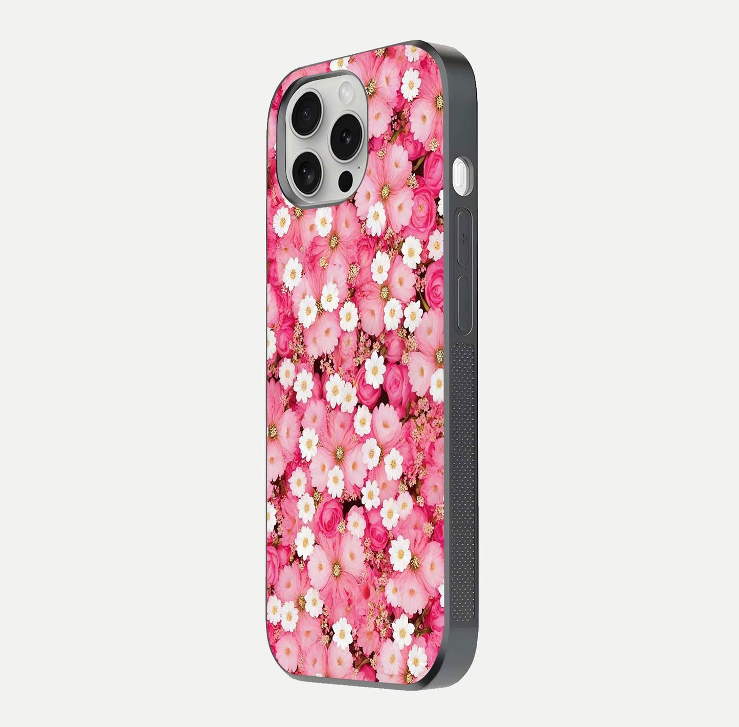 Pink Daisy Bliss Glass Case for iPhone 16 Pro side-angle image showing delicate daisy pattern and glass reflection