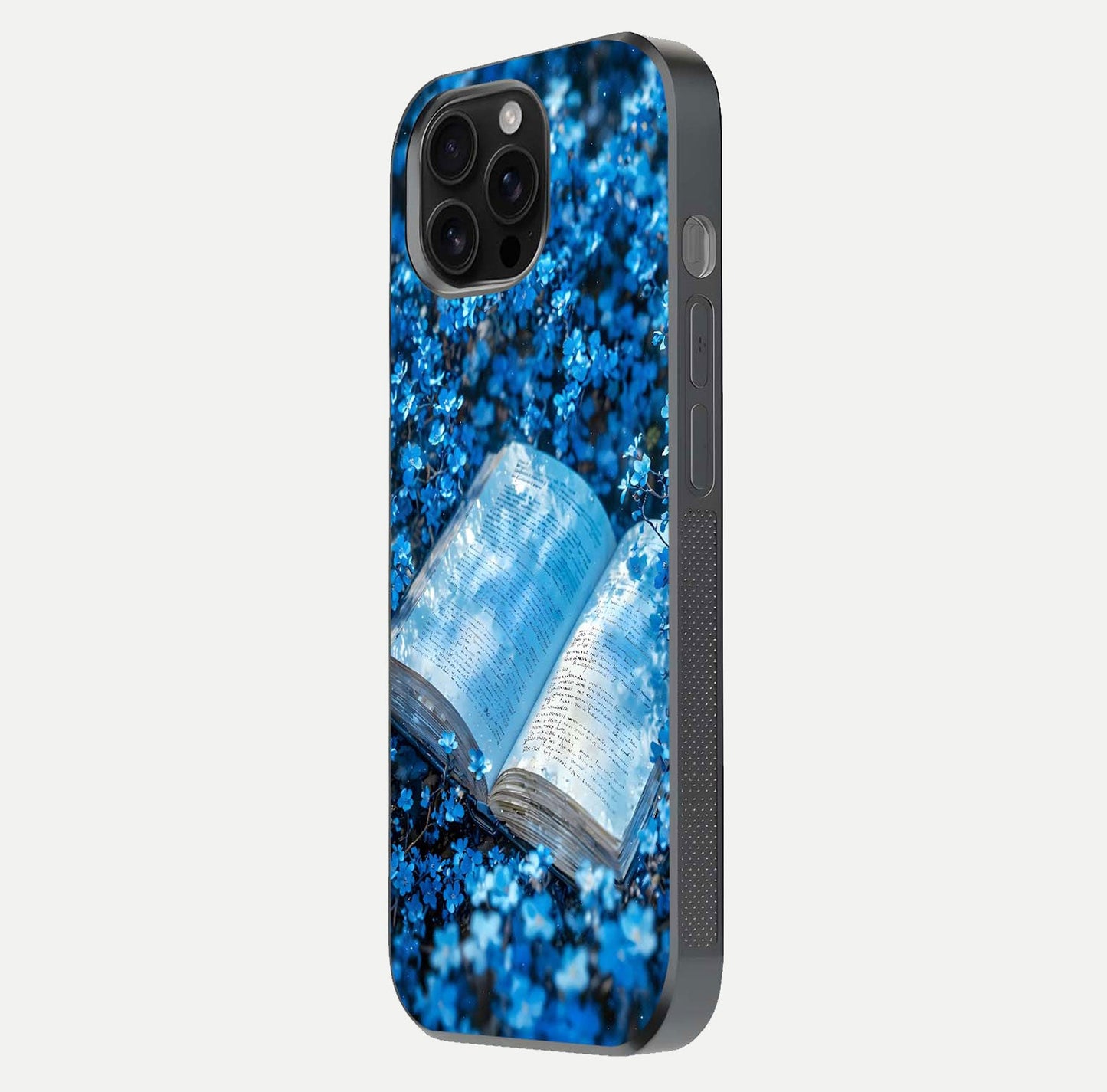 Blue Bloom Tales Glass Case for iPhone 16 Pro Max side-angle image showing blue floral pattern and glossy finish