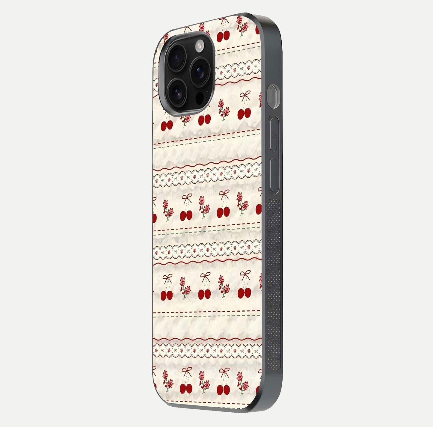 Cherry Bloom Charm Glass Case for iPhone 16 Pro Max side-angle photo showing flower detail and edge light
