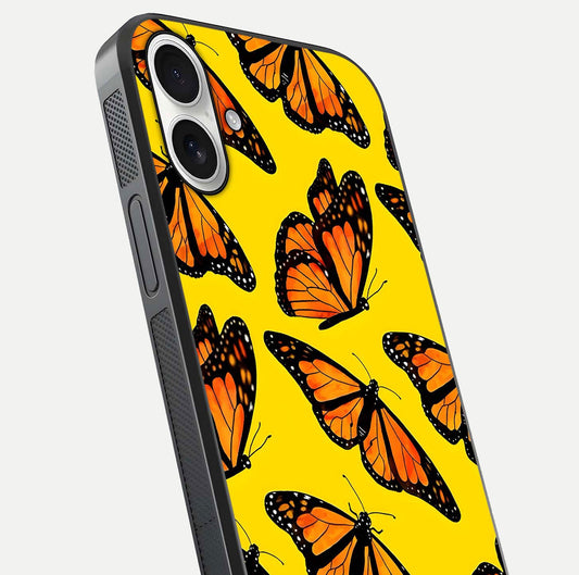 Golden Wing Flight Glass Case for iPhone 17 close-up angled shot showing metallic wing texture and shine detail