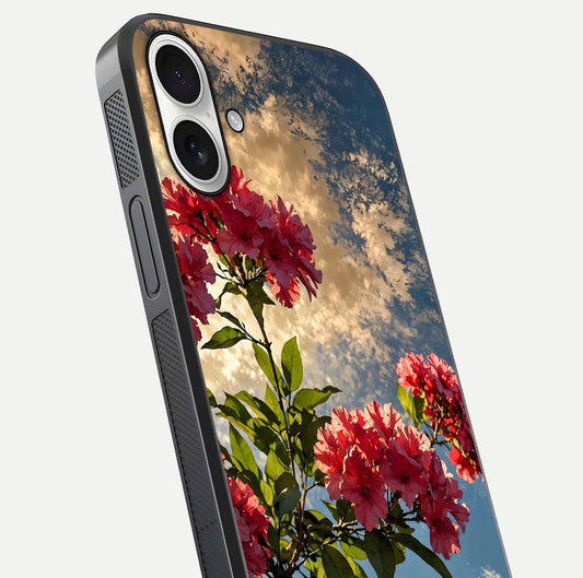 Red Bloom Skies Glass Case for iPhone 17 close-up angled shot highlighting detailed blooms and reflection