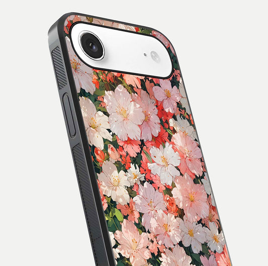 Blush Bloom Field Glass Case for iPhone Air close-up shot capturing pastel flower field tones and gloss shine