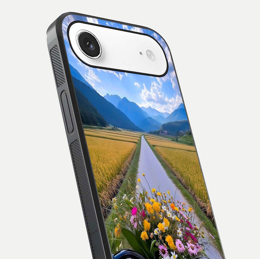 Golden Field Journey Glass Case for iPhone Air close-up angled shot showing sunlight tones and reflection clarity