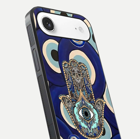 Hamsa Divine Guard Glass Case for iPhone Air close-up angled shot showing detailed palm motif and reflection glow