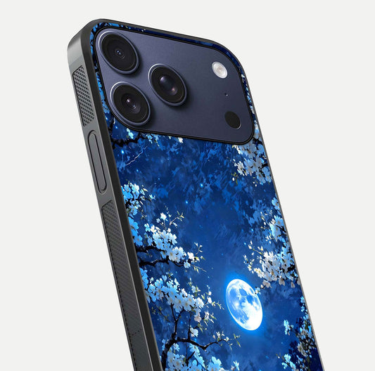 Blossom Moonlight Sky Glass Case for iPhone 17 Pro close-up angle capturing moon glow and flower detail reflections