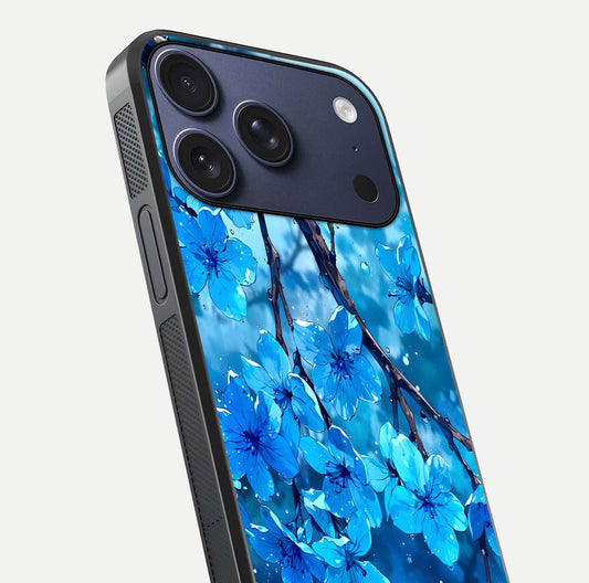 Blue Blossoms Branch Glass Case for iPhone 17 Pro close-up angle highlighting petal details and reflection gloss